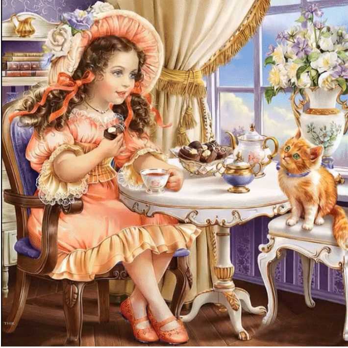 Девочка с кошкой сидят за столом